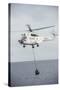 An SA-330 Puma Transport Helicopter Moves Cargo During a Vertical Replenishment-null-Stretched Canvas