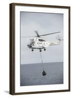 An SA-330 Puma Transport Helicopter Moves Cargo During a Vertical Replenishment-null-Framed Photographic Print