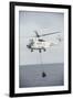 An SA-330 Puma Transport Helicopter Moves Cargo During a Vertical Replenishment-null-Framed Photographic Print