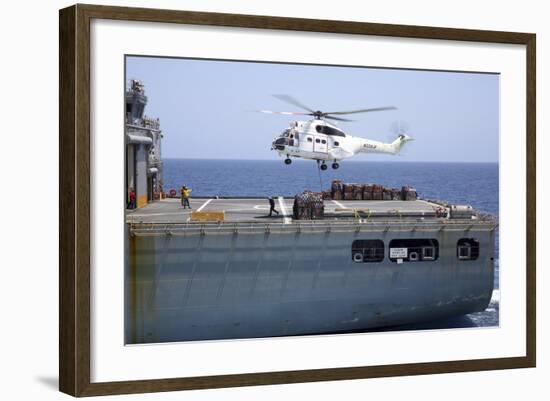 An SA-330J Puma Helicopter Delivers Supplies to USS Kearsarge-null-Framed Photographic Print