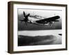 An Sb2c (Curtiss Helldiver) Flies over a Japanese Convoy Burning in Cam Ranh Bay after Attack by Pl-null-Framed Photographic Print