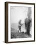 An Unidentified Australian Artillery Driver Cleaning Mud from His Team's Harness in a Billet Near M-null-Framed Photographic Print