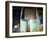 An Unidentified Boy Stands Outside a House-null-Framed Photographic Print