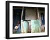 An Unidentified Boy Stands Outside a House-null-Framed Photographic Print