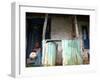 An Unidentified Boy Stands Outside a House-null-Framed Photographic Print