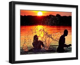 An Unidentified Couple Splashes in Lake Wandlitz Near Berlin on a Warm Evening-null-Framed Premium Photographic Print