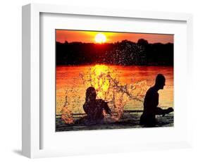 An Unidentified Couple Splashes in Lake Wandlitz Near Berlin on a Warm Evening-null-Framed Photographic Print