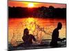 An Unidentified Couple Splashes in Lake Wandlitz Near Berlin on a Warm Evening-null-Mounted Photographic Print