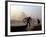 An Unidentified Cyclist Gets Down with His Cycle against the Backdrop of the Taj Mahal-null-Framed Photographic Print