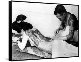 An Unidentified Japanese Tattoo Artist Works on a Woman's Backside-null-Framed Stretched Canvas
