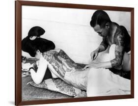 An Unidentified Japanese Tattoo Artist Works on a Woman's Backside-null-Framed Photographic Print