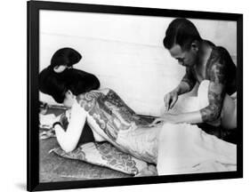 An Unidentified Japanese Tattoo Artist Works on a Woman's Backside-null-Framed Photographic Print