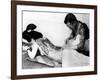 An Unidentified Japanese Tattoo Artist Works on a Woman's Backside-null-Framed Photographic Print