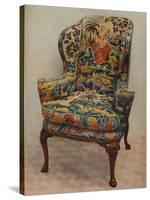 An upholstered armchair with wings, carved walnut frame and original silk needlework covering-Unknown-Stretched Canvas