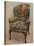 An upholstered armchair with wings, carved walnut frame and original silk needlework covering-Unknown-Stretched Canvas