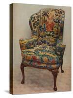 An upholstered armchair with wings, carved walnut frame and original silk needlework covering-Unknown-Stretched Canvas