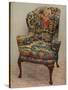 An upholstered armchair with wings, carved walnut frame and original silk needlework covering-Unknown-Stretched Canvas