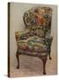 An upholstered armchair with wings, carved walnut frame and original silk needlework covering-Unknown-Stretched Canvas