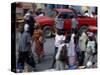 An Water Vendor Walks in the Streets of Port-Au-Prince, Haiti-null-Stretched Canvas