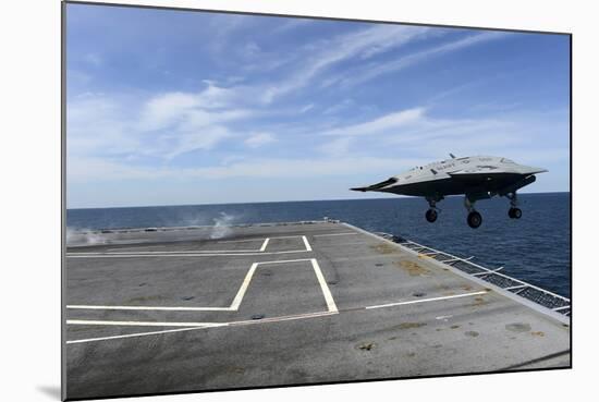 An X-47B Unmanned Combat Air System Launches from USS George H.W. Bush-null-Mounted Photographic Print