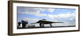 An X-47B Unmanned Combat Air System on the Flight Deck of USS George H.W. Bush-null-Framed Photographic Print