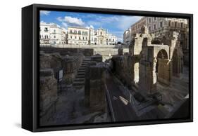 Ancient builldings and Roman ruins in the old town, Lecce, Apulia, Italy, Europe-Roberto Moiola-Framed Stretched Canvas