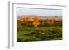 Ancient temple and pagoda rising out of the jungle at sunrise, Bagan, Mandalay Region, Myanmar-Keren Su-Framed Photographic Print