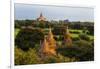 Ancient temple and pagoda rising out of the jungle at sunrise, Bagan, Mandalay Region, Myanmar-Keren Su-Framed Photographic Print