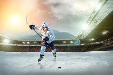 Ice Hockey Player on the Ice. Open Stadium - Winter Classic Game.-Andrey Yurlov-Framed Photographic Print