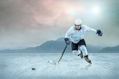 Football Player with Ball in Action Outdoors-Andrey Yurlov-Photographic Print