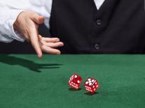 Croupier Throwing A Pair of Dice-AndreyPopov-Framed Photographic Print