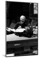 Andy at Typewriter, The Factory, NYC, circa 1965-Andy Warhol/ Nat Finkelstein-Mounted Art Print