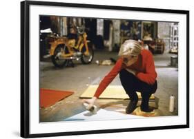 Andy with Spray Paint and Moped, The Factory, NYC, circa 1965-Andy Warhol/ Nat Finkelstein-Framed Giclee Print