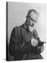 Anglo Irish Playwright George Bernard Shaw Writing in Notebook at "Pygmalion."-null-Stretched Canvas