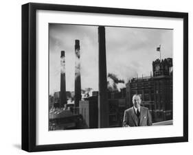 Anheuser Busch Heir Augusta. Busch Jr. Standing in Front of a Budweiser Brewery-Margaret Bourke-White-Framed Photographic Print