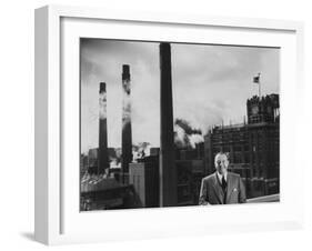 Anheuser Busch Heir Augusta. Busch Jr. Standing in Front of a Budweiser Brewery-Margaret Bourke-White-Framed Photographic Print