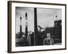 Anheuser Busch Heir Augusta. Busch Jr. Standing in Front of a Budweiser Brewery-Margaret Bourke-White-Framed Photographic Print