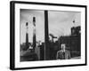 Anheuser Busch Heir Augusta. Busch Jr. Standing in Front of a Budweiser Brewery-Margaret Bourke-White-Framed Photographic Print