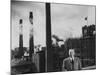 Anheuser Busch Heir Augusta. Busch Jr. Standing in Front of a Budweiser Brewery-Margaret Bourke-White-Mounted Photographic Print