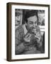 Animator and Movie Producer Walt Disney Eating Chicken-null-Framed Photographic Print