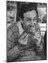 Animator and Movie Producer Walt Disney Eating Chicken-null-Mounted Photographic Print