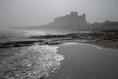 Waves Breaking at Bamburgh Beach Looking Towards Bamburgh Castle on a Misty Morning-Ann and Steve Toon-Photographic Print