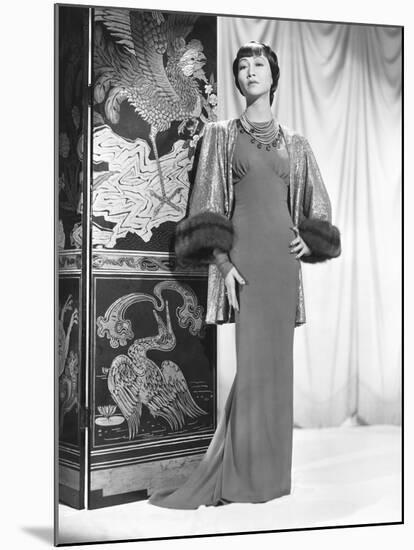 Anna May Wong in an Edith Head-Designed Crepe Dinner Gown with a Jacket of Emerald-null-Mounted Photo