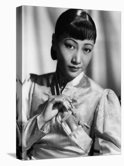 Anna May Wong, in an Orange Nanking Brocade Robe with Sandalwood Fastenings, 1937-null-Stretched Canvas
