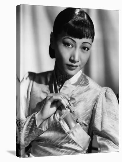 Anna May Wong, in an Orange Nanking Brocade Robe with Sandalwood Fastenings, 1937-null-Stretched Canvas