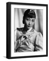 Anna May Wong, in an Orange Nanking Brocade Robe with Sandalwood Fastenings, 1937-null-Framed Photo