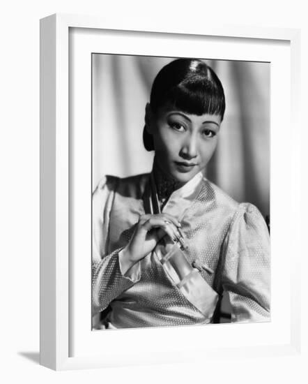 Anna May Wong, in an Orange Nanking Brocade Robe with Sandalwood Fastenings, 1937-null-Framed Photo