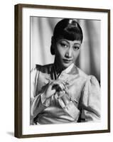 Anna May Wong, in an Orange Nanking Brocade Robe with Sandalwood Fastenings, 1937-null-Framed Photo