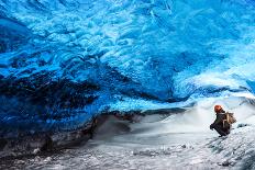 Man Traveler Enjoying Exotic Landmark, Sitting in the Ice Cave, Skaftafell Glacier, Vatnajokull Nat-Anna Om-Photographic Print