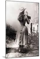 Annie Oakley Shooting over Shoulder-null-Mounted Premium Photographic Print